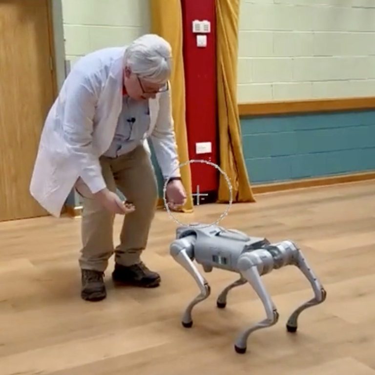 The Immersium | Professor Byte meets Beeblebrox Professor in lab coat, meeting a Robotic Dog